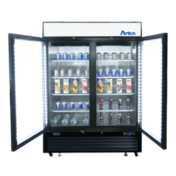 Front view of a commercial freezer with 2 doors that are opened and beverage containers that are spaced out on the shelves inside