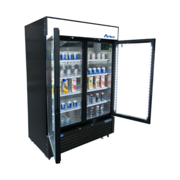 Angled view of the left side of a commercial freezer with 2 doors that are open and arranged beverages on the interior shelves