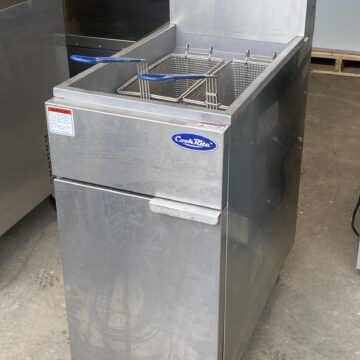 Angled view stainless steel double deep fryer on wheels