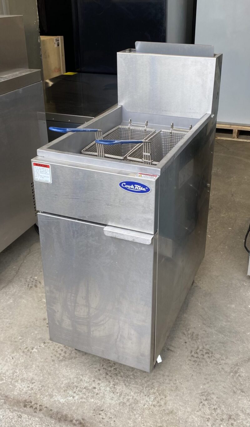 Angled view stainless steel double deep fryer on wheels