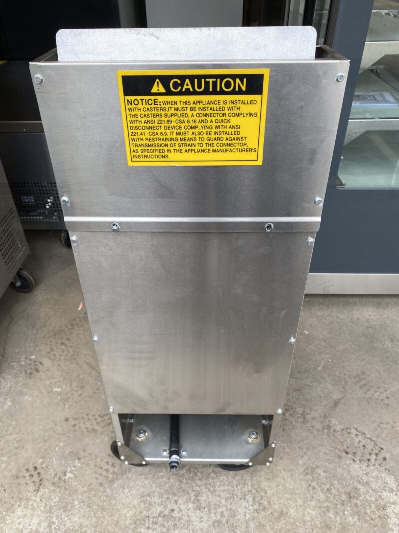 Back view showing caution sticker for deep fryer