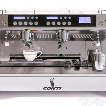 Front view double brew front control white Conti espresso machine with coffee cup and milk frother