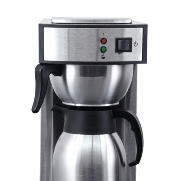 Top half of a commercial coffee maker showcasing the canister and power buttons