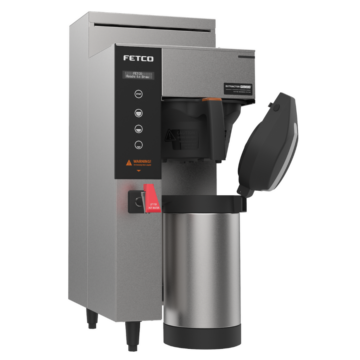 Angled view of the left side of a commercial coffee maker with a single thermos with lid open on the right side