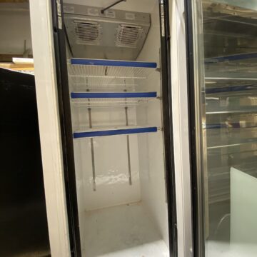 Front picture open glass door upright freezer showing 3 shelves inside