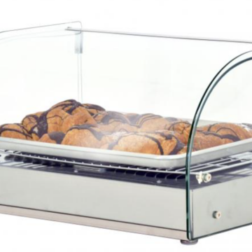 Front side view of display warmer with baked goods inside