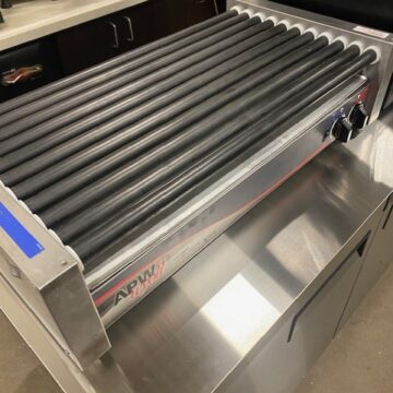 Top front view left side hot dog roller grill