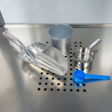 scoop, measure cups and ss cup on tray