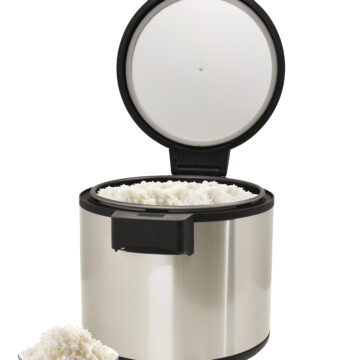SS rice warmer with rice inside and bowl of rice