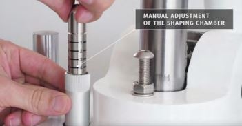 manual adjustment of the shaping chamber