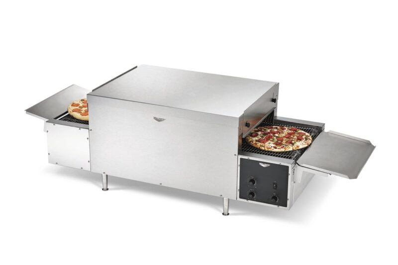 stainless steel pizza oven with pizza